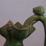 Antica brocca in terracotta policroma