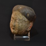 Antica testa in terracotta