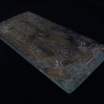Antico specchio cinese in bronzo