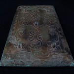 Antico specchio cinese in bronzo