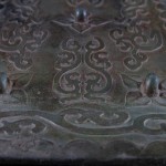 Antico specchio cinese in bronzo