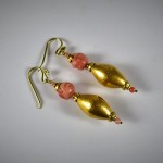 Orecchini in oro e antico corallo rosa