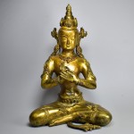 Scultura in bronzo dorato - Buddha Vairochana
