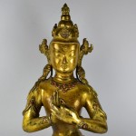 Scultura in bronzo dorato - Buddha Vairochana