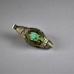 Antico ornamento tibetano in argento e turchese