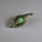 Antico ornamento tibetano in argento e turchese