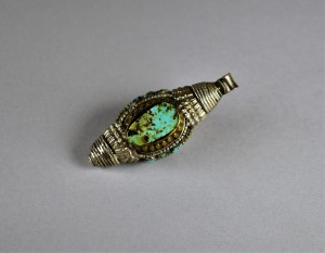 Antico ornamento tibetano in argento e turchese