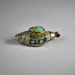 Antico ornamento tibetano in argento e turchese
