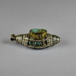 Antico ornamento tibetano in argento e turchese