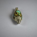 Antico ornamento tibetano in argento e turchese